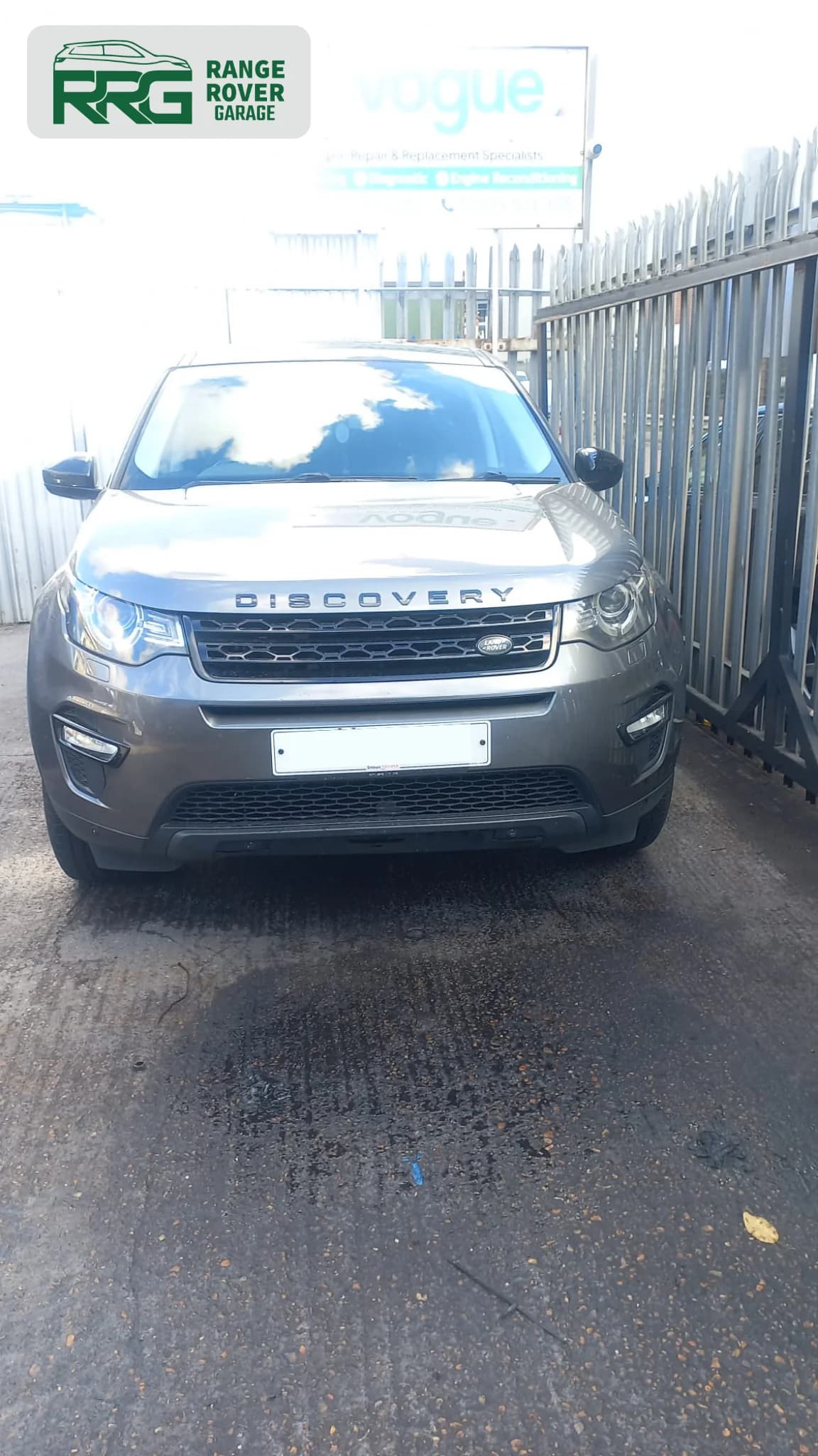 Grey Range Rover outside the workshop