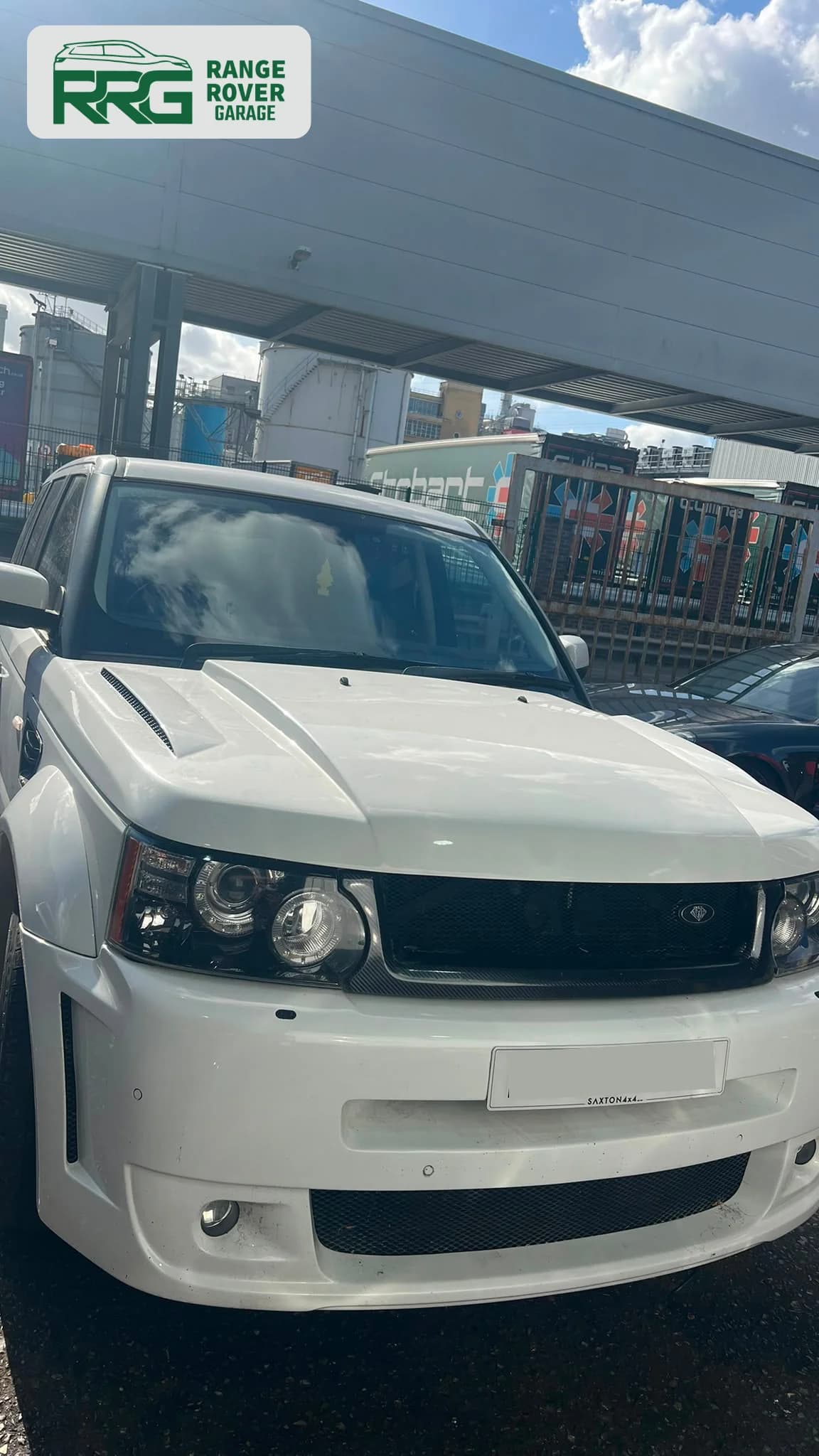 White Range Rover outside Range Rover Garage