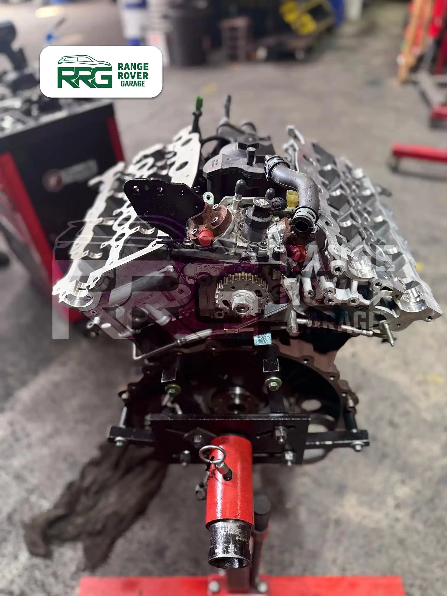 Partially dismantled engine mounted on a workshop stand