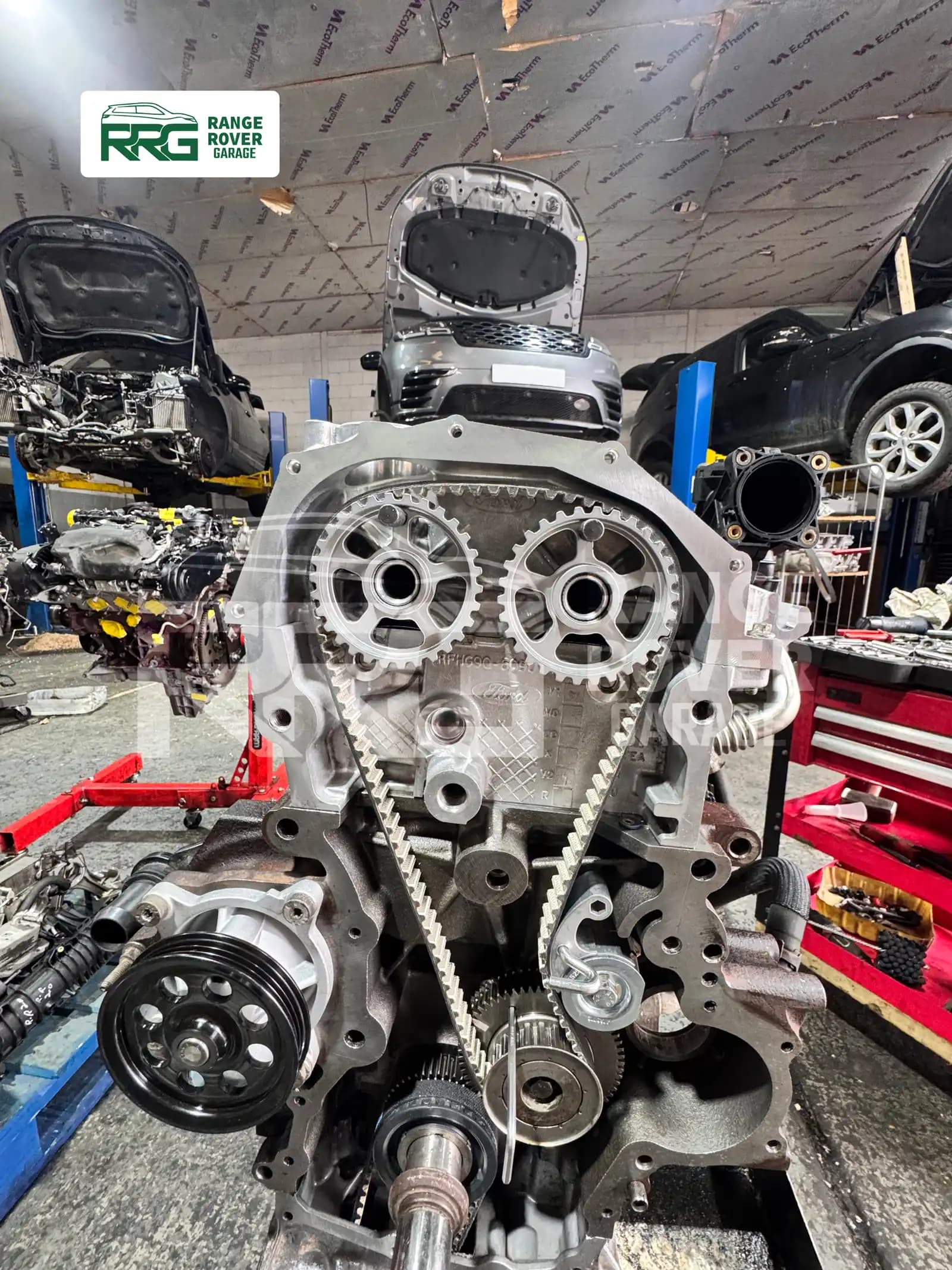 Exposed timing gears on an engine mounted on a stand
