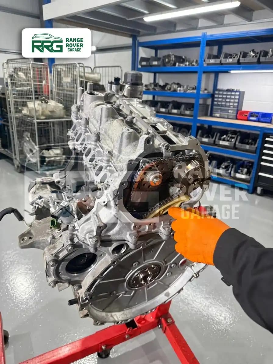 Mechanic working on exposed timing components of an engine