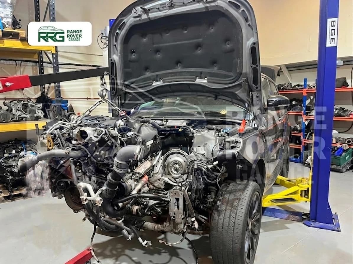 Engine and drivetrain removed from a Range Rover in the workshop